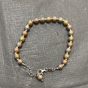 Elegant Gold and Silver Beaded Bracelet